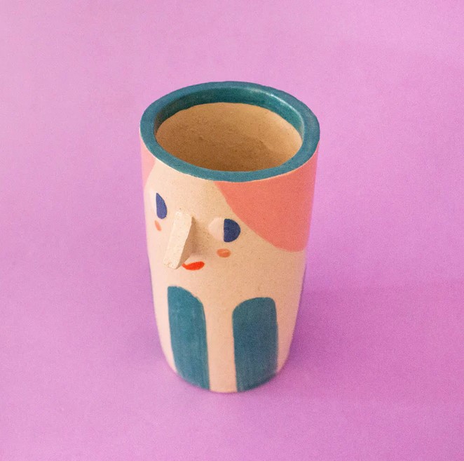Girl with teal stripes vase
